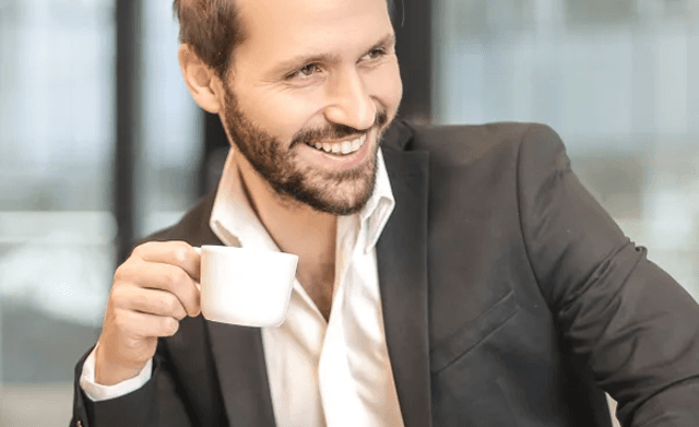 man drinking coffee